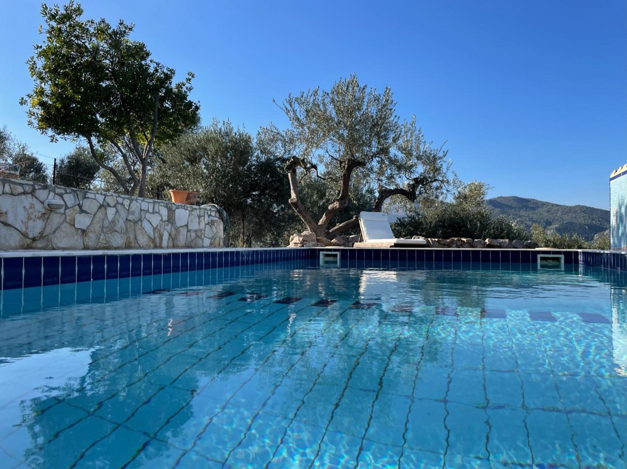 Orange Apartments Epano Epidhavros Bagian luar foto
